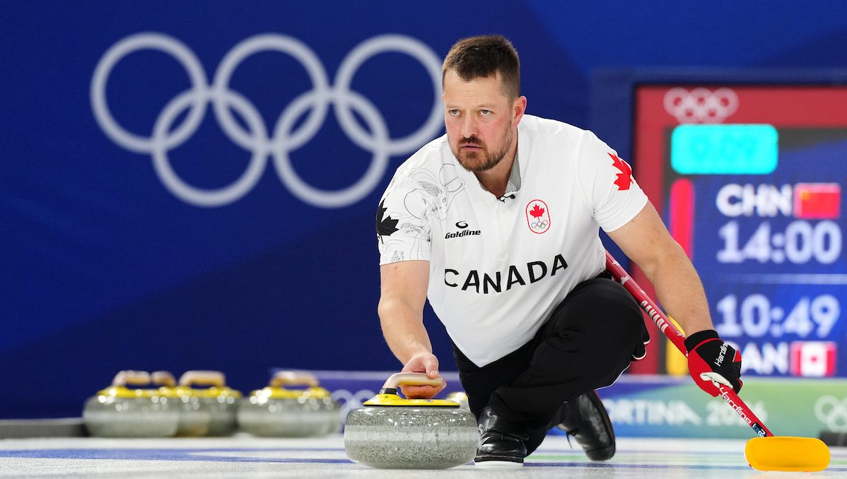 Action de curling pendant un match
